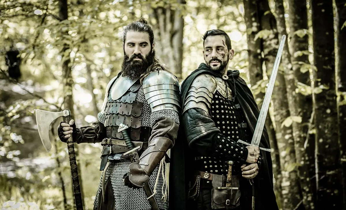 Scène de bataille fantastique sombre avec guerriers et châteaux enneigés